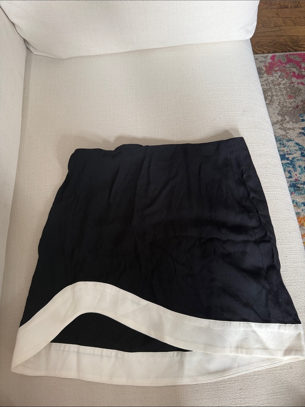 Reformation Black Mini Skirt with White Hem. Size 4.
